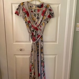 Floral dress with tie at the waist.